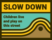slow down children live and play here
