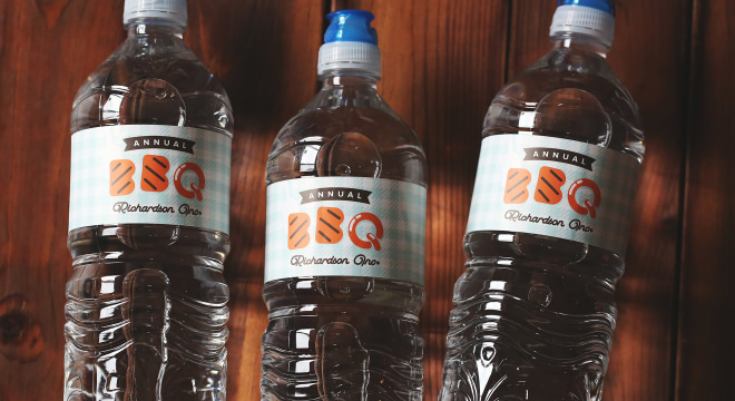 Custom product labels applied to water bottles