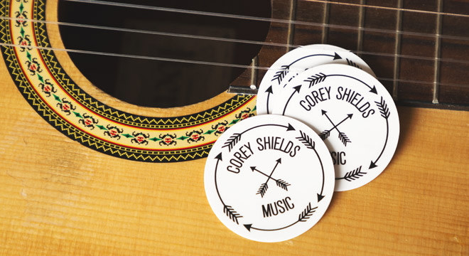 Band stickers on guitar
