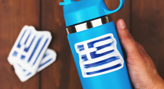 Greece flag sticker on a water bottle