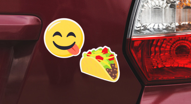Custom emoji magnets on car trunk