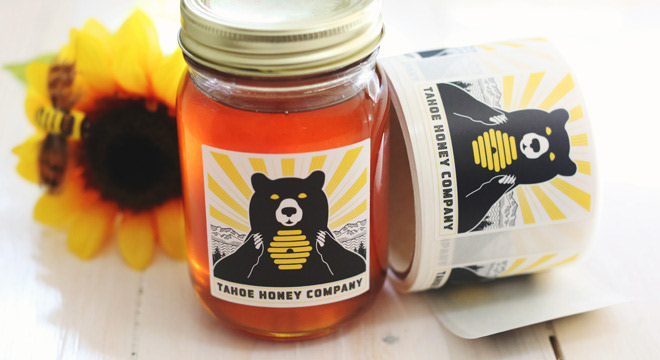 Custom honey labels applied to honey jar