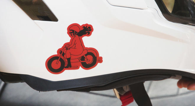 Custom sticker applied to motorcycle helmet