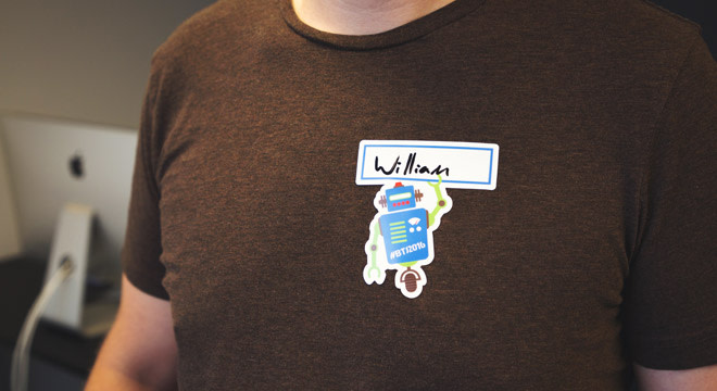 Name tag stickers on t-shirt