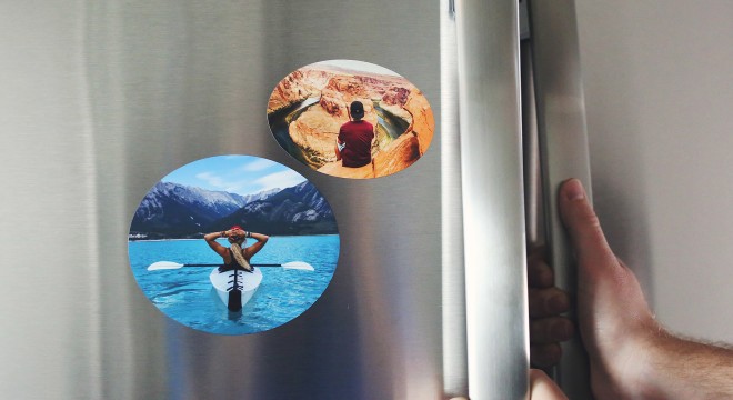 Custom oval magnets on fridge