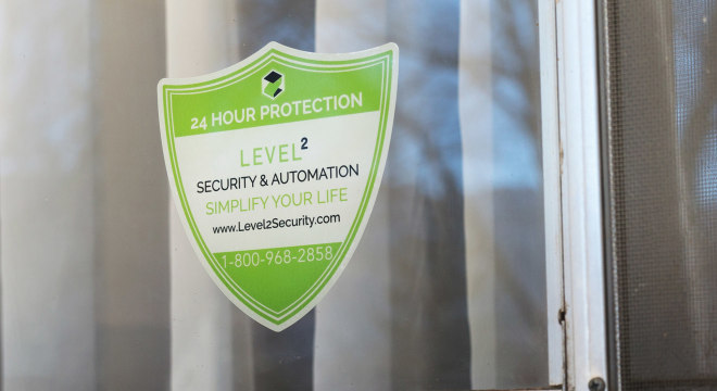 Custom security sticker applied to window