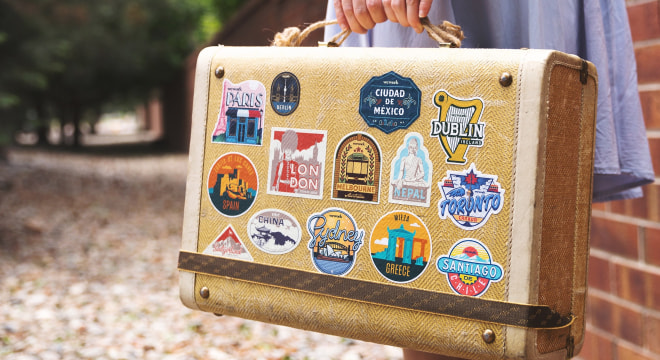 Custom travel stickers on suitcase