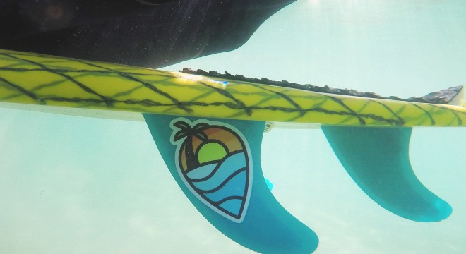 Waterproof sticker on surfboard