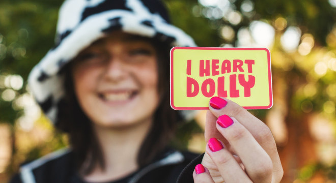 proudly displaying a custom rounded corner sticker for dolly