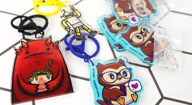 a bunch of cute cartoon acrylic charms 