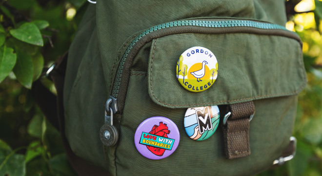 multiple medium custom buttons on a backpack