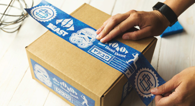 Packaging tape sealing cardboard box