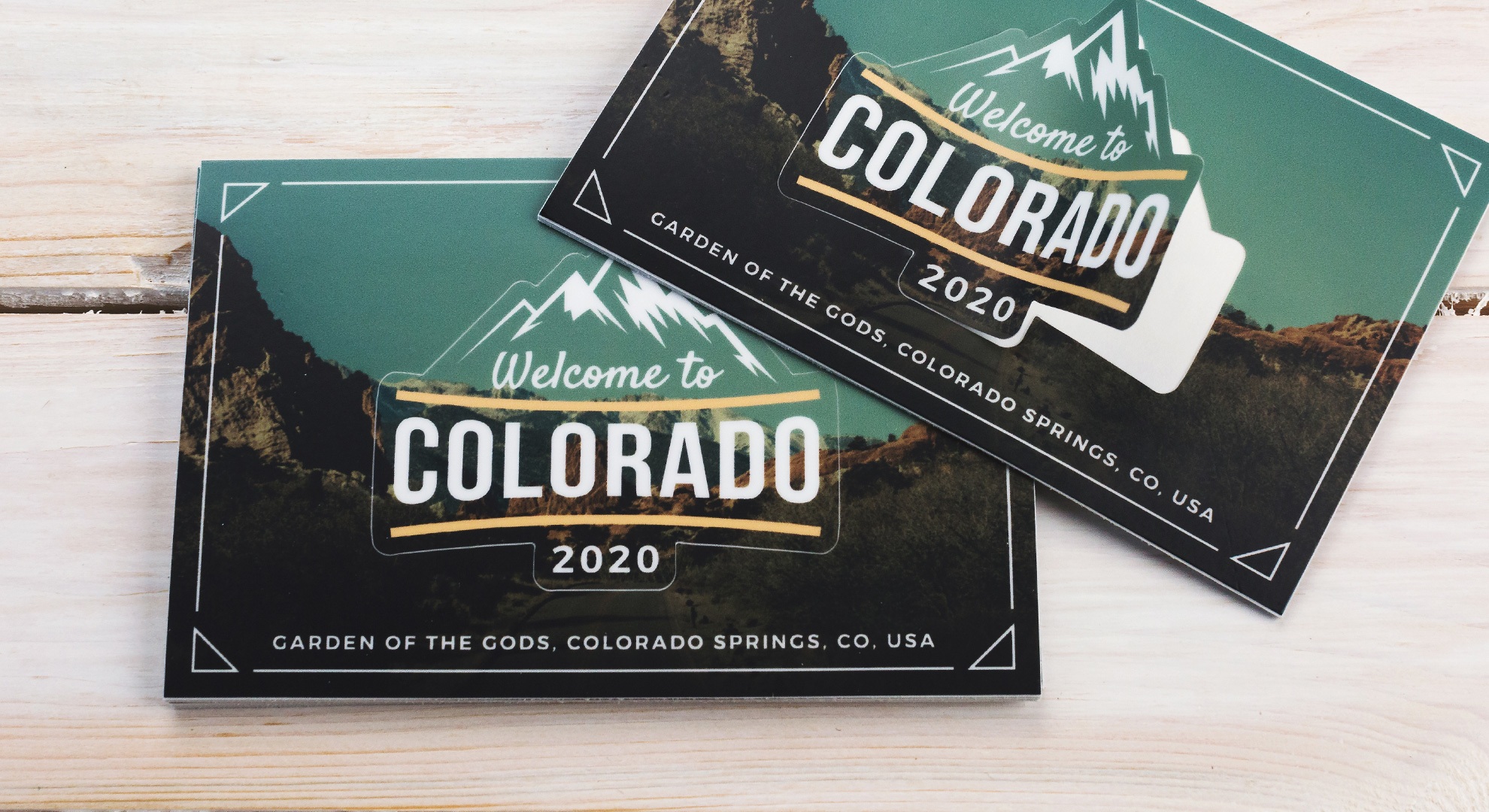 Custom kiss cut stickers that look like postcards from colorado