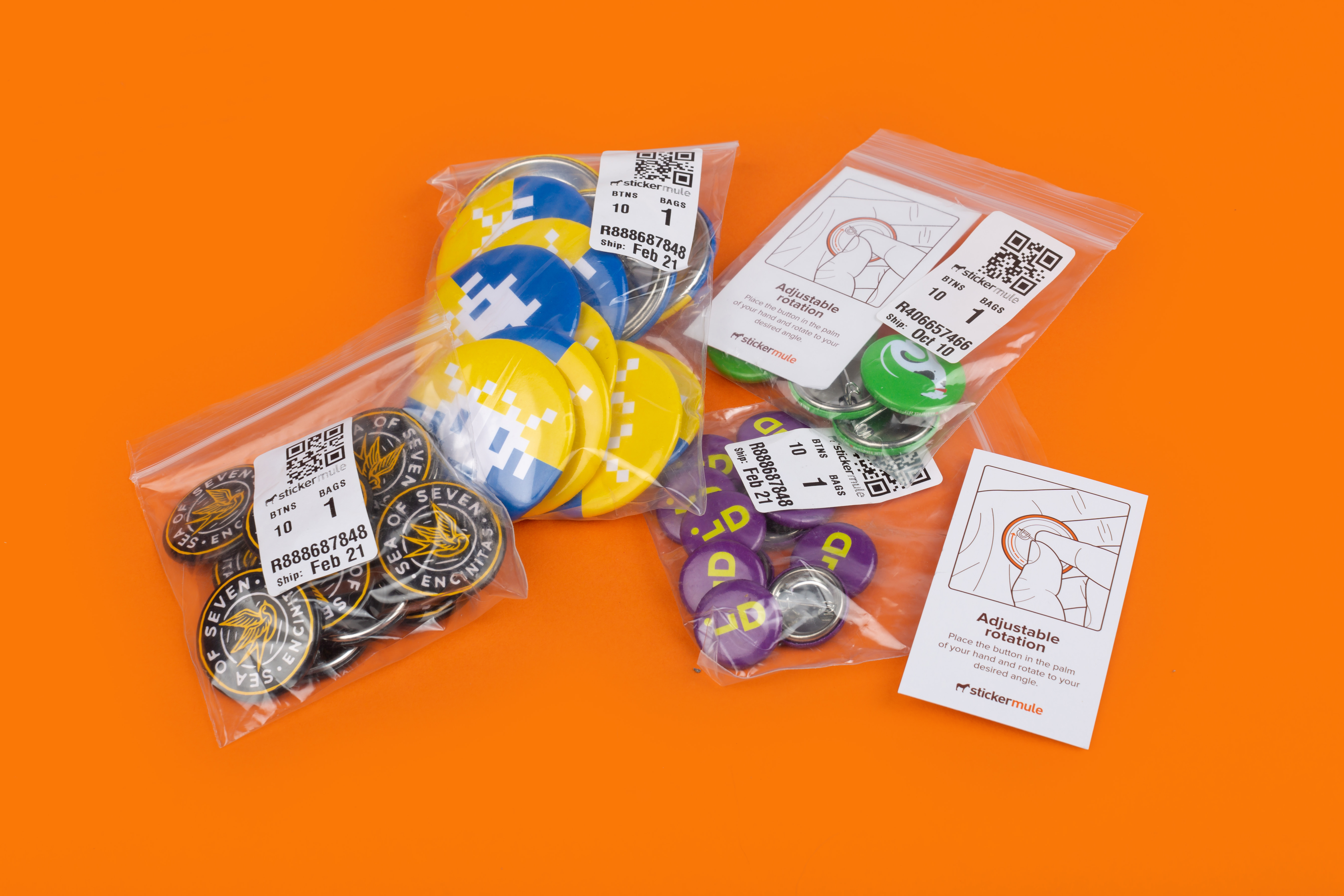 custom badges in plastic bags with instructions on an orange background