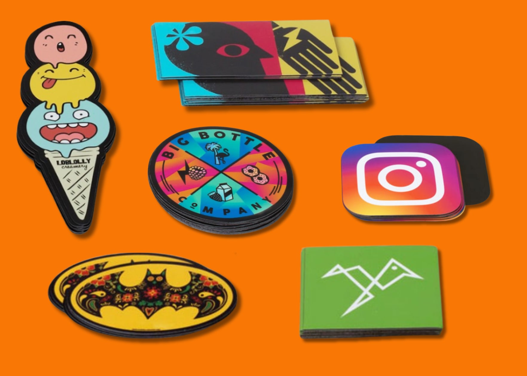 different types of custom magnets and shapes on a orange background