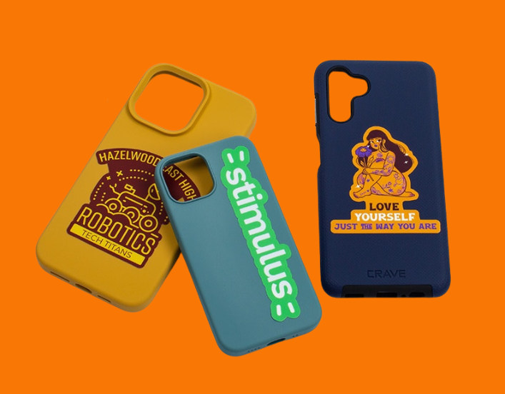 phone cases with custom printed stickers on an orange background