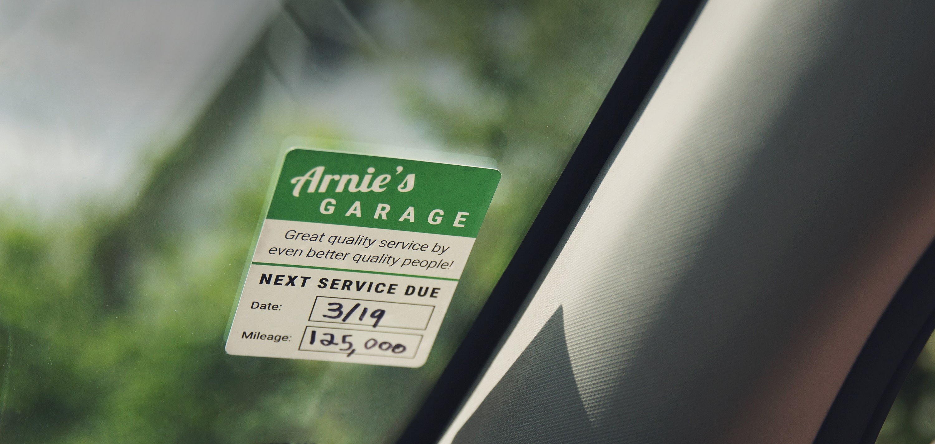 a custom oil change window cling for cars