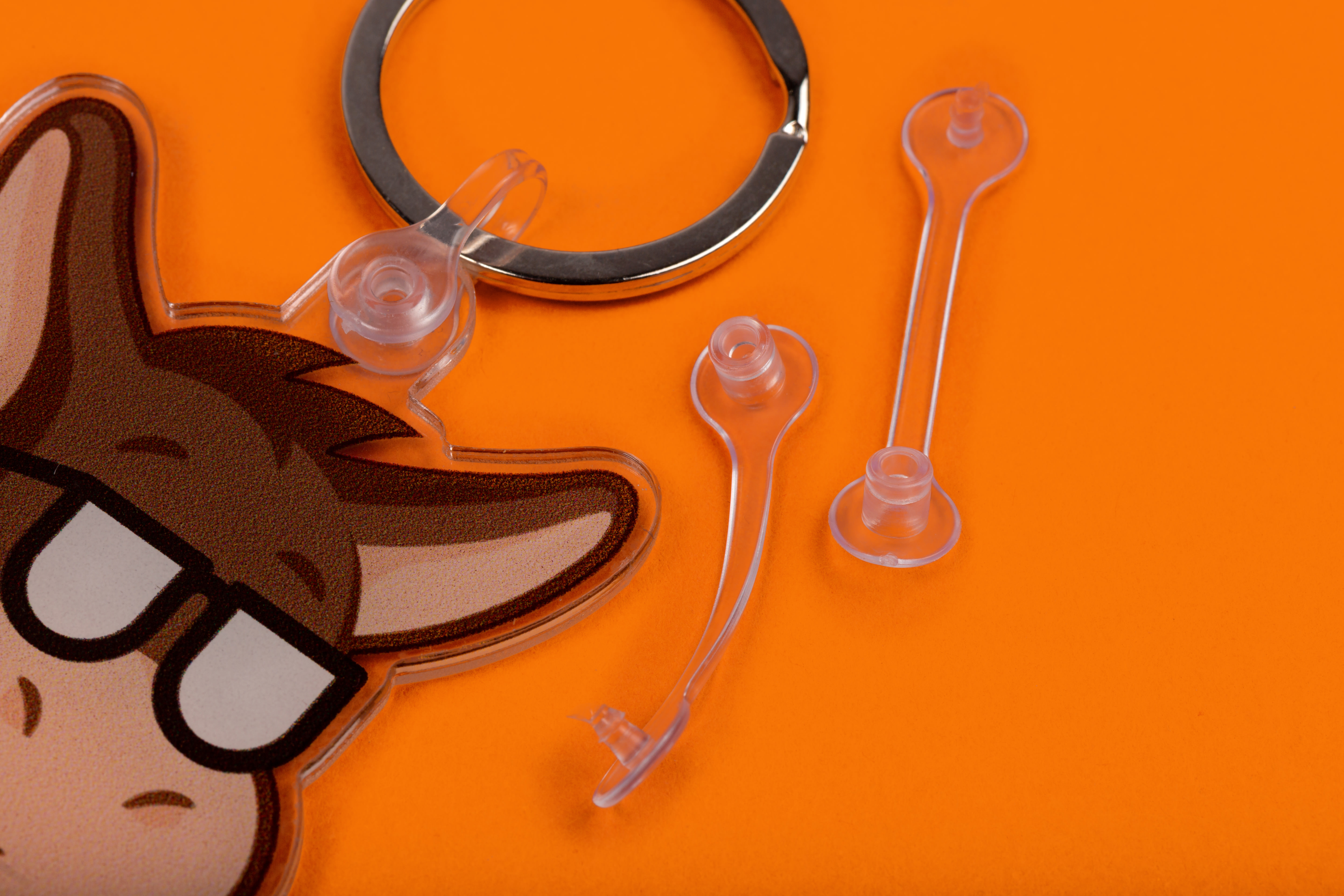 close up of custom keychain ring on orange background