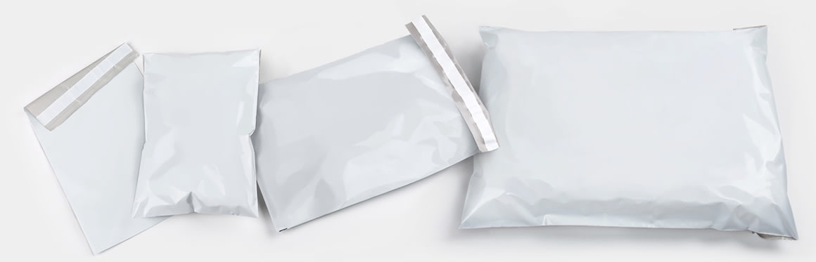 blank white poly mailers on a white background