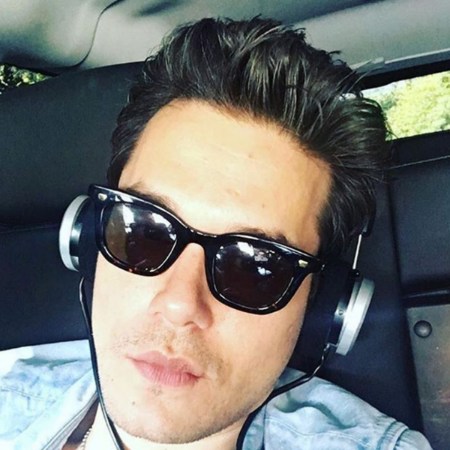 John Mayer wearing Grado Headphones