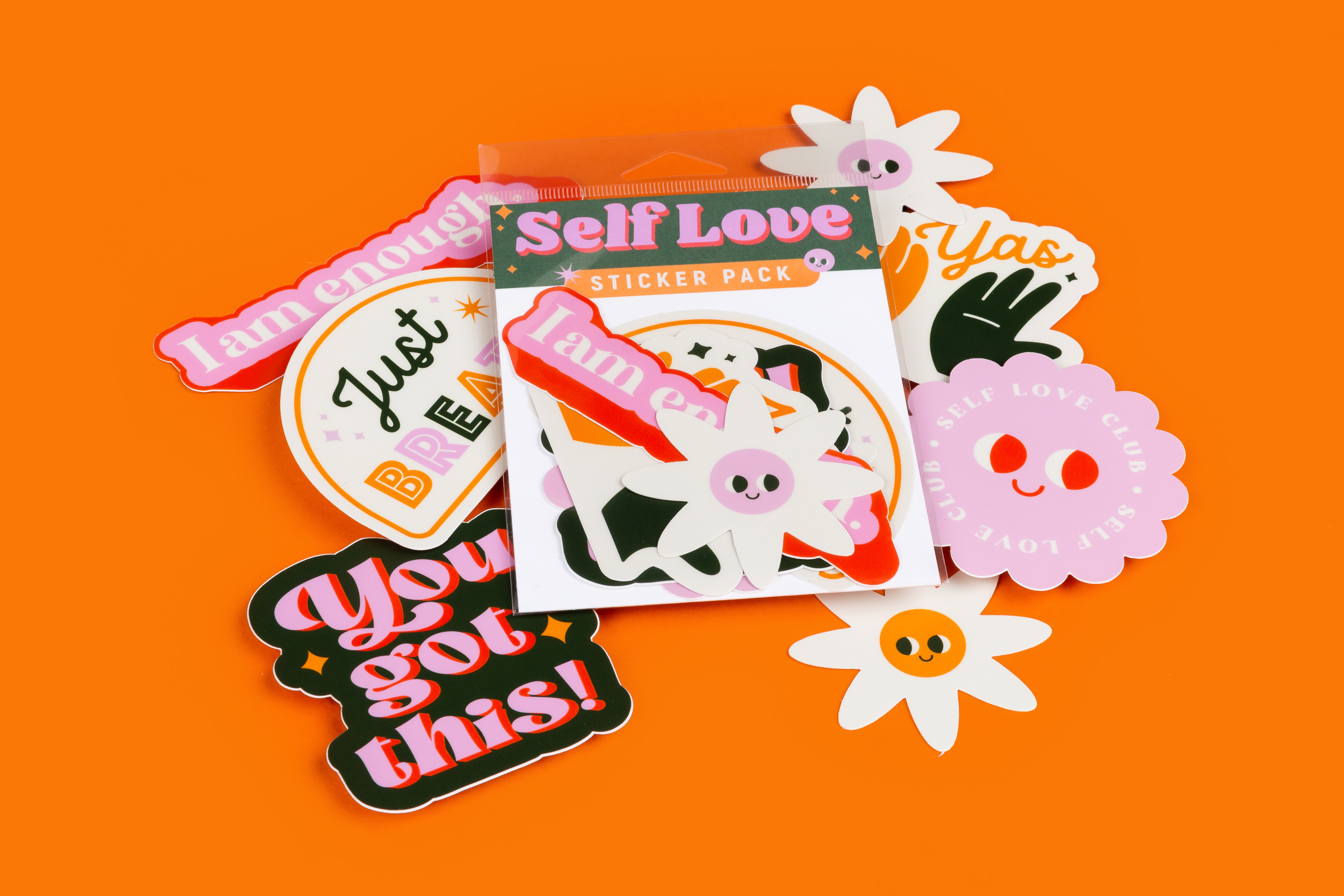 sticker pack with white and pink flowers and self love statements. 