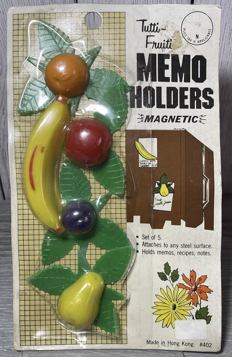 a set of fruit magnets from the 1960s selling on eBay